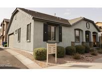 Charming single-story home featuring desert landscaping, neutral stucco and a classic tiled roof at 250 N Sandal --, Mesa, AZ 85205