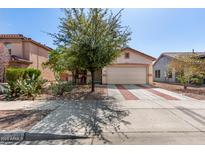 Charming single-story home with a two-car garage and well-manicured desert landscaping at 219 E Valley View Dr, Phoenix, AZ 85042