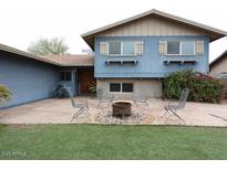 Inviting backyard with a cozy firepit and plenty of space for outdoor entertaining at 6847 S Willow Dr, Tempe, AZ 85283