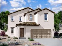 Charming two-story home showcasing a neutral stucco exterior, a tiled roof, and a two-car garage at 9819 W Agora Ln, Tolleson, AZ 85353