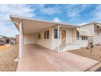 Charming single-story home with covered parking and cozy front porch in a well-maintained community at 17200 W Bell Rd # 77, Surprise, AZ 85374