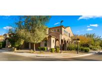 Attractive two-story home with a well-manicured front yard on a corner lot at 4611 E Casitas Del Rio Dr, Phoenix, AZ 85050