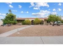 Charming single story home with red tile roof, mature trees, and desert landscaping at 1213 W Esplanade St, Mesa, AZ 85201