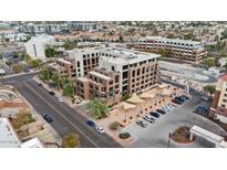 An aerial view of a contemporary condo complex boasting a central location, and stylish architecture at 7301 E 3Rd Ave # 101, Scottsdale, AZ 85251