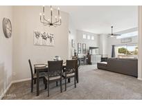 Inviting living space featuring dining area and an abundance of natural light from clerestory windows at 11260 N 92Nd St # 2025, Scottsdale, AZ 85260