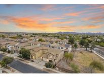 Beautiful aerial view of a residential community with well-maintained homes and desert landscaping at 19013 E Seagull Dr, Queen Creek, AZ 85142
