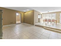 Spacious living room with tile floors and great natural lighting at 2348 W Laurel Ln, Phoenix, AZ 85029