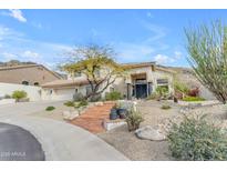 Inviting two-story home with landscaped front yard and brick steps leading to the entrance at 2008 E Rock Wren Rd, Phoenix, AZ 85048