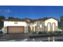 Stunning home with stone accents, tile roof, arched entryway, and well-manicured landscaping at 6790 S Springs Pl, Chandler, AZ 85249
