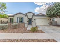 Charming single-story home features a welcoming facade and well-maintained landscaping at 3439 E Shannon St, Gilbert, AZ 85295