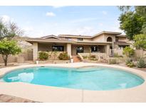 Wonderful backyard pool and lovely exterior with brick accents and desert landscaping at 6340 N 34Th Pl, Paradise Valley, AZ 85253