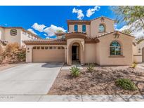Charming two-story home with a neutral color palette, archway entry, and a well-maintained landscaped front yard at 12887 N 93Rd Dr, Peoria, AZ 85381