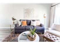 Cozy living room features a comfortable sofa, stylish decor, and a well-lit space at 4600 N 68Th St # 368, Scottsdale, AZ 85251