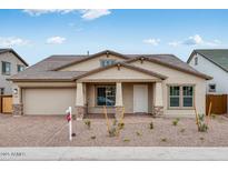 Charming single-story home featuring a well-manicured front yard and attached two-car garage at 8324 W Palo Verde Dr, Glendale, AZ 85305