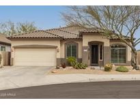 Charming single-story home with desert landscaping and a neutral color palette in a serene neighborhood at 2212 W Calle De Las Estrella St, Phoenix, AZ 85085