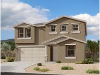 Charming two-story home featuring a two car garage, neutral color palette, and beautiful xeriscaping at 2337 E Homesteader Rd, San Tan Valley, AZ 85140
