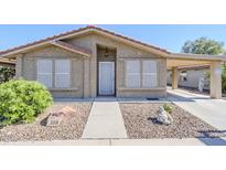 Charming single-story home featuring low maintenance landscaping and covered parking at 7373 E Us Highway 60 -- # 108, Gold Canyon, AZ 85118