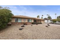 Charming home featuring a well-maintained front yard and appealing curb appeal at 8317 E Via De La Escuela --, Scottsdale, AZ 85258