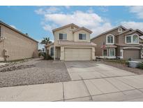 Charming two-story home with a tile roof and well-maintained front yard at 4613 E Douglas Ave, Gilbert, AZ 85234