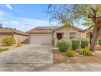 Beautiful single-Gathering home featuring a well-maintained front yard and paved driveway at 21816 E Puesta Del Sol --, Queen Creek, AZ 85142