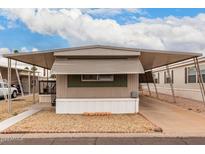 Charming single-story home with a covered carport and low-maintenance landscaping at 2650 W Union Hills Dr # 350, Phoenix, AZ 85027