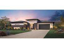 Modern single-Gathering home with a two-car garage, manicured landscaping, and a stylish, contemporary design at 3501 W Sunstone Dr, San Tan Valley, AZ 85144