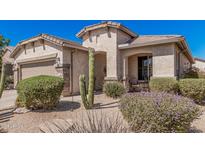 Charming single-story home with desert landscaping and a covered front porch at 208 W Lantern Way, San Tan Valley, AZ 85143