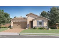 Inviting single-story home featuring a 2-car garage, stone accents, neutral paint, and well-manicured landscaping at 15815 W Kendall St, Goodyear, AZ 85338