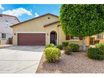 Charming single-story home featuring a well-maintained yard and a two-car garage at 16771 W Adams St, Goodyear, AZ 85338