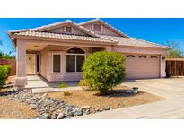 Charming single-story home featuring a low-maintenance yard and a cozy covered porch at 18850 N 16Th Pl, Phoenix, AZ 85024