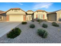 Charming single-story home featuring a low-maintenance landscape and neutral color scheme at 5133 S Brice --, Mesa, AZ 85212