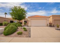 Charming single story home featuring a terra cotta roof and lush landscaping at 12244 N Tower Dr, Fountain Hills, AZ 85268