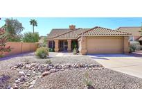 Charming single-story home with desert landscaping and a tile roof at 4152 N Signal Cir, Mesa, AZ 85215