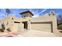 Charming single-story home featuring a private entry, two-car garage, and beautiful desert landscaping at 16609 N 29Th Dr, Phoenix, AZ 85053