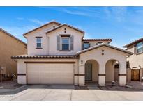 Charming two-story home featuring a stucco exterior, a covered entryway, and an attached two-car garage at 2929 E Binner Dr, Chandler, AZ 85225