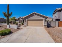 Charming single-Gathering home with a two-car garage, desert landscaping, and a stucco exterior at 23306 S 221St St, Queen Creek, AZ 85142