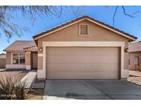 Charming single-story home featuring a tile roof, two-car garage and well-maintained desert landscaping at 3117 W Casino Ave, Phoenix, AZ 85083