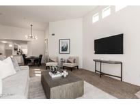 Bright living room featuring modern furnishings, neutral tones and an open-concept floor plan at 11260 N 92Nd St # 2023, Scottsdale, AZ 85260