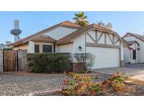 Charming single-story home featuring a two-car garage, landscaped yard, and inviting curb appeal at 1705 E Juanita Ave, Mesa, AZ 85204