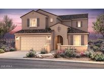 Charming two-story home features a welcoming facade, lush landscaping, and a convenient two-car garage at 17614 W Palo Verde Dr, Litchfield Park, AZ 85340