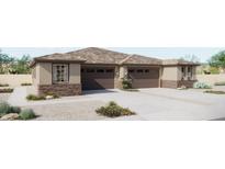 Charming single-story home with a neutral color scheme, attached two-car garage, and low maintenance desert landscaping at 5633 N 205Th Ln, Buckeye, AZ 85396