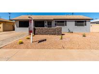 Charming single-story home with desert landscaping, and well-maintained front yard at 1310 W Romo Jones St, Tempe, AZ 85281