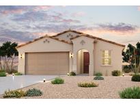 Charming single-story home with a two-car garage, stucco siding, and tile roof at 1935 S 246Th Ln, Buckeye, AZ 85326