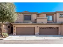 Two-story home featuring a spacious two-car garage and desert landscaping at 705 W Queen Creek Rd # 1154, Chandler, AZ 85248