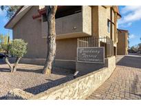 Charming condo building sign 