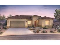 Beautiful single-story home with desert landscaping, a two-car garage, and a red tile roof at 26836 W Rosemonte Dr, Buckeye, AZ 85396