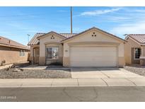 Charming single-story home with a well-maintained yard and a two-car garage at 10515 W Pasadena Ave, Glendale, AZ 85307