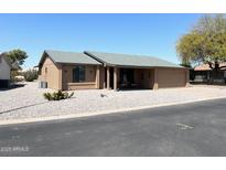 Charming single-story home featuring a xeriscaped yard for easy maintenance and desert appeal at 1132 S 81St Pl, Mesa, AZ 85208