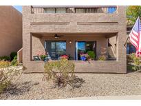 Charming patio area featuring potted plants and comfortable seating with a ceiling fan at 16657 E Gunsight Dr # 181, Fountain Hills, AZ 85268