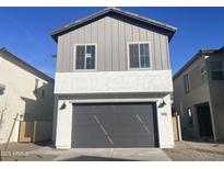 Charming two-story home with a gray exterior and a two-car garage at 4517 S Mole --, Mesa, AZ 85212